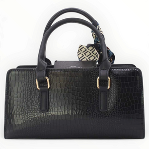 SUL EXTRAS Tom & Eva Amélie black croc-effect handbag with gold hardware, top handles, and a decorative scarf.