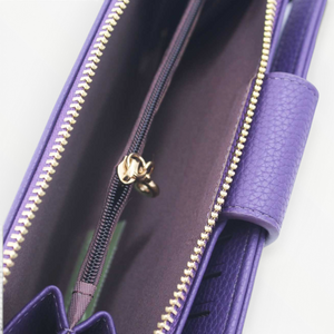 SUL EXTRAS Tom & Eva purple pebbled leather-effect wallet with gold-tone zip and interior compartments
