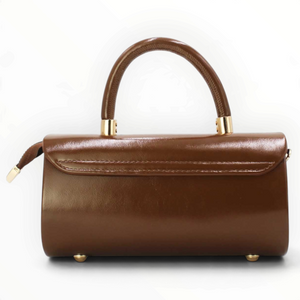 SUL EXTRAS Tom & Eva Colette brown patent-effect barrel handbag with gold-tone hardware and top handle