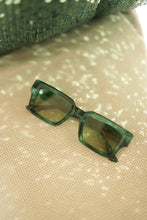 Load image into Gallery viewer, Sefsan Evolution tortoise teal frame sunglasses with transparent green lenses, lightweight design, and versatile style for casual and outdoor use front view