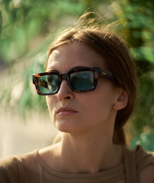 Sefsan Evolution tortoise brown frame sunglasses with transparent blue tinted lenses, lightweight design, and versatile style for casual and outdoor use