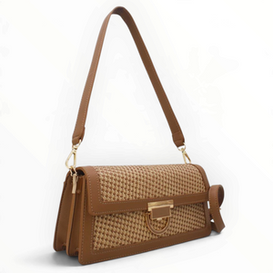 SUL EXTRAS Tom & Eva Riviera shoulder bag in tan straw-effect material with gold-tone clasp and detachable strap.