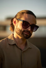 Load image into Gallery viewer, Unisex Sefsan BOBA sunglasses featuring black tortoise full-rim frame, gradient smoke lenses, and sleek contemporary fashion look model side view