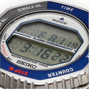 SUL EXTRAS Seiko Rotocall digital watch with blue and grey rotating bezel and standard digital display