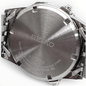 SUL EXTRAS Seiko Rotocall digital watch stainless steel screw-in case back with engraved branding and specifications.
