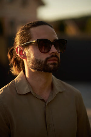 Unisex Sefsan BOBA sunglasses featuring black tortoise full-rim frame, gradient smoke lenses, and sleek contemporary fashion look model front view