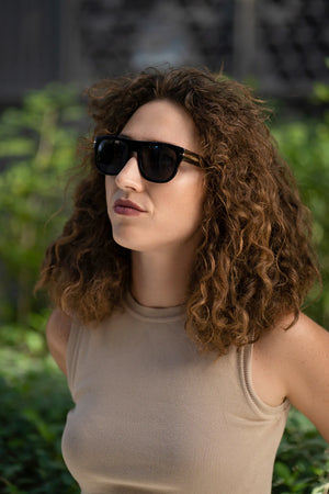 Unisex Sefsan Nehsan sunglasses featuring square D-frame, tinted smoke lenses, and stylish contemporary streetwear look model side view