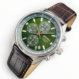 SUL EXTRAS Seiko chronograph watch with a green dial, gold-tone hands, and a brown embossed calfskin leather strap.