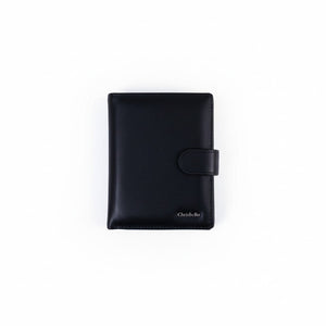 SUL EXTRAS Chrisbella Apex black fine-grain leather bi-fold wallet with a secure snap-tab closure