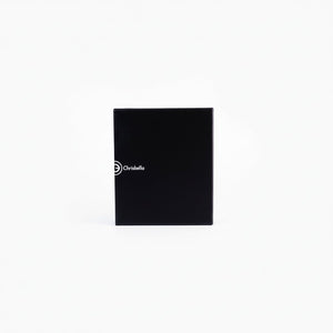 SUL EXTRAS Chrisbella Apex black leather wallet gift box with white logo branding on a clean white background
