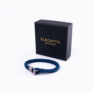 SUL EXTRAS Elegatto Voyage navy blue nautical yarn bracelet with a silver-plated shackle clasp and branded gift box.