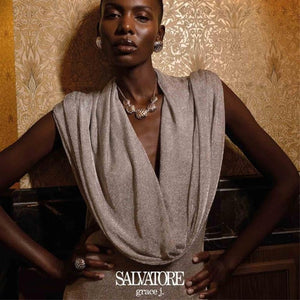 Model wearing SUL EXTRAS Madras Rhodum rhodium-plated stainless steel necklace and matching textured stud earrings