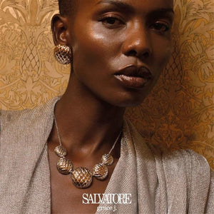 SUL EXTRAS Madras Rhodum rhodium-plated stainless steel necklace and earring set with textured spherical design