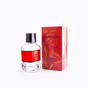 SUL EXTRAS Harmony Night by Qarnoza Eau de Parfum 100ml bottle and red floral packaging box on a white background.