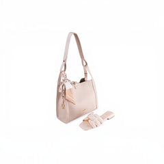 SUL EXTRAS Sahara Silk Set featuring an off-white shoulder bag with a patterned scarf and matching nude flat slides.