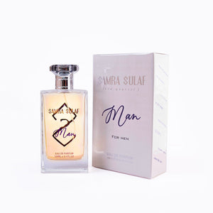 SUL EXTRAS Samra Sulaf Man eau de parfum 100ml glass bottle with silver cap next to its branded white gift box