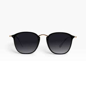 SUL EXTRAS Visi sunglasses featuring a shiny black rectangle frame with green gradient lenses and metal accents.