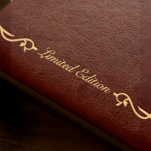 SUL EXTRAS brown leather watch box cover with gold embossed Limited Edition text and decorative flourishes