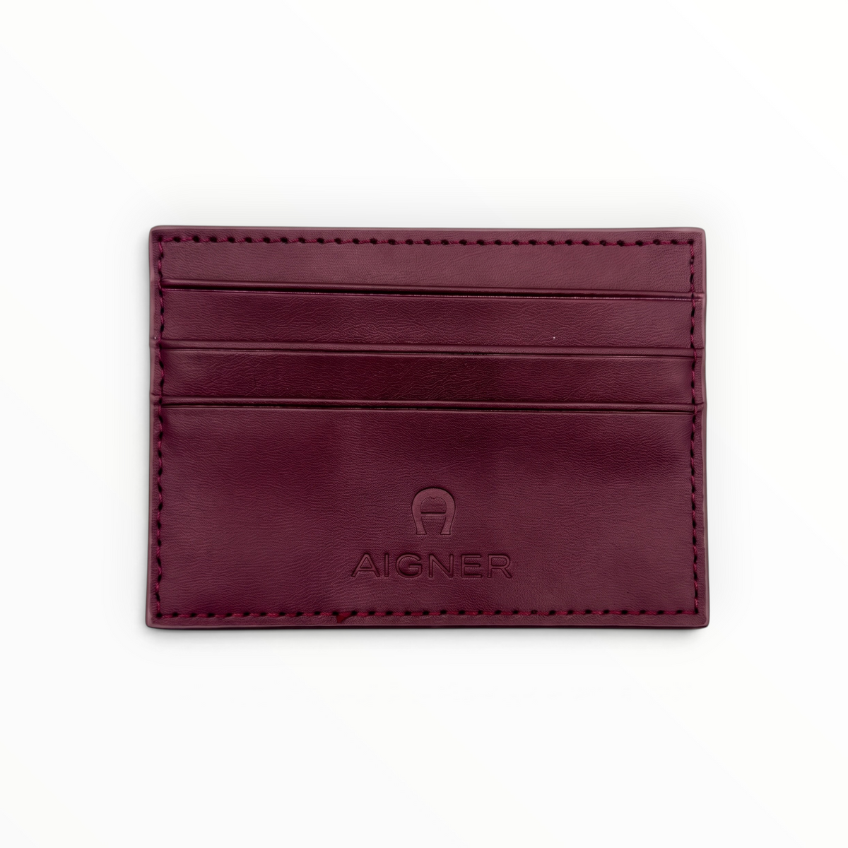 SUL EXTRAS Aigner slim burgundy leather card holder with tonal saddle stitching and embossed horseshoe logo
