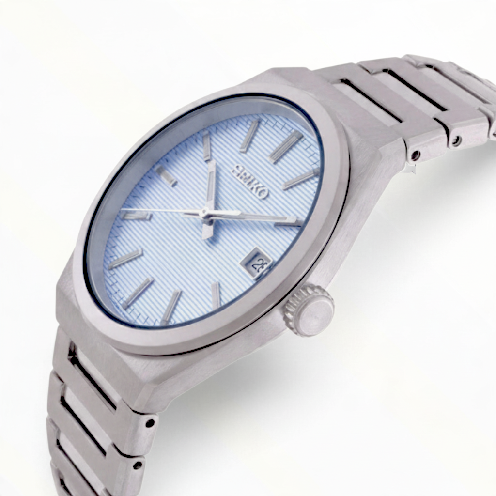 SUL EXTRAS Seiko Classic men's watch with a light blue textured dial, silver stainless steel case, and bracelet.