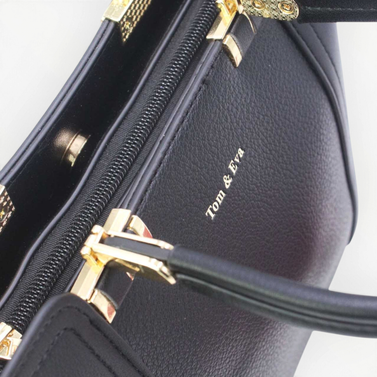 SUL EXTRAS Tom & Eva Camille black structured handbag with gold-tone hardware and top handles