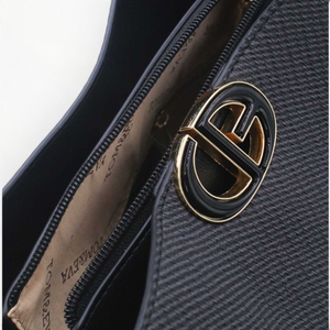 SUL EXTRAS Margot bucket bag in black grained synthetic leather with gold-tone emblem and zipped interior compartment
