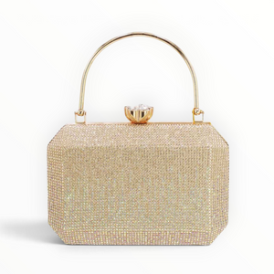 SUL EXTRAS Odette evening bag in gold with shimmering rhinestone detailing, arched handle, and faceted floral clasp.
