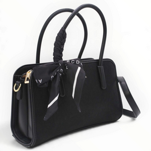 SUL EXTRAS Tom & Eva Juliette black structured handbag with gold-tone hardware and a decorative printed scarf
