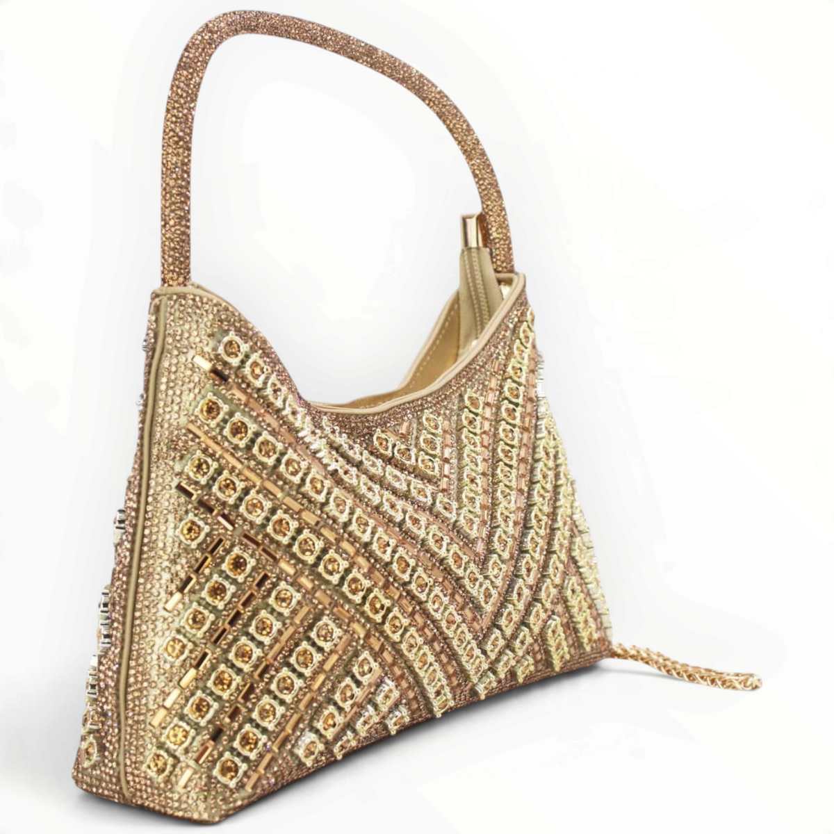 SUL EXTRAS Céleste evening bag in gold with geometric rhinestone embellishments and a curved top handle.