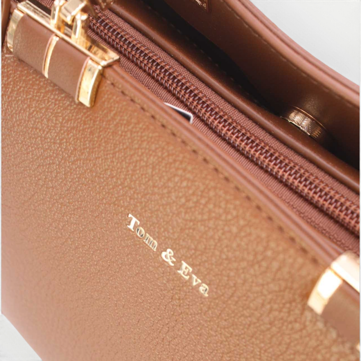 SUL EXTRAS Tom & Eva Camille handbag in brown leather-effect synthetic with gold-tone zip and branding detail