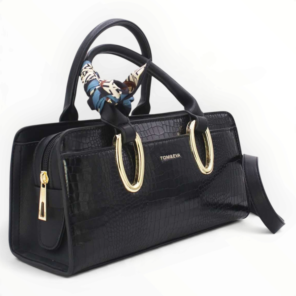 SUL EXTRAS Tom & Eva Amélie black croc-effect handbag with gold-tone oval handles and a decorative patterned scarf.