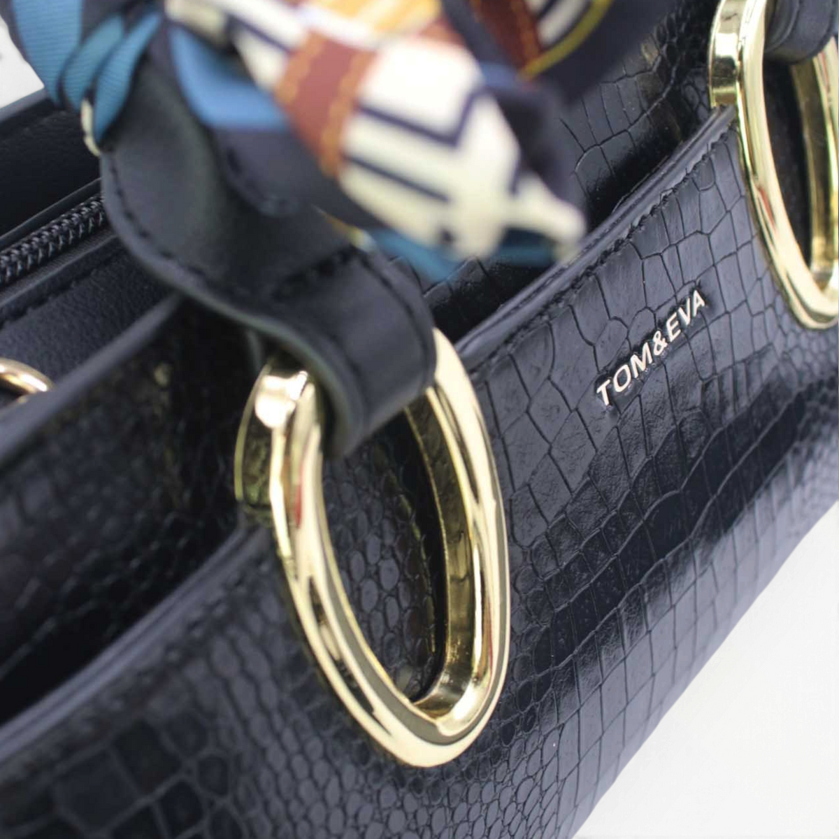 SUL EXTRAS Tom & Eva Amélie black croc-effect handbag with gold-tone oval handles and a patterned decorative scarf