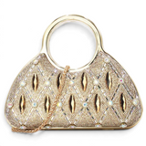 SUL EXTRAS Aurelia evening bag featuring gold rhinestone latticework, circular handles, and a detachable chain strap.