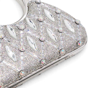 SUL EXTRAS Aurelia evening bag featuring silver rhinestone latticework and faceted embellishments with circular handles