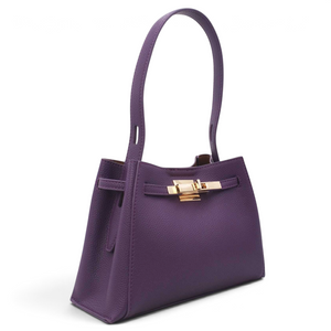 SUL EXTRAS Adèle shoulder bag in purple grained synthetic leather with gold-tone hardware and a structured silhouette.