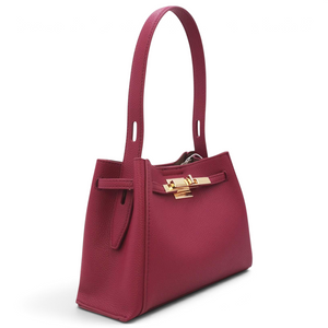SUL EXTRAS Adèle shoulder bag in burgundy grained synthetic leather with gold-tone hardware and belt detail.