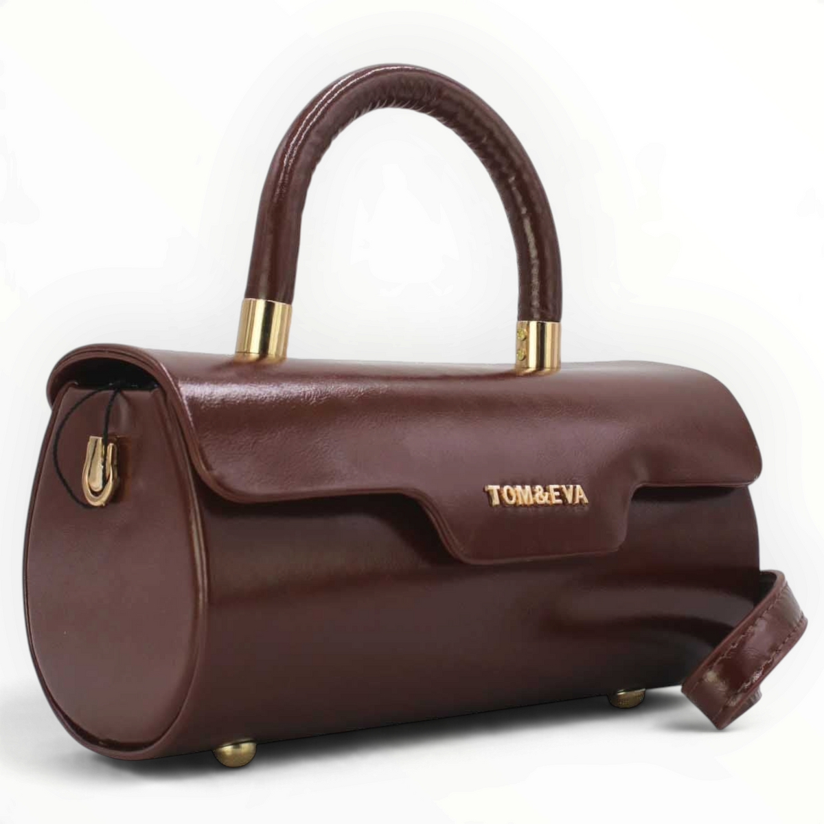 SUL EXTRAS Tom & Eva Colette brown barrel handbag with glossy patent finish, gold-tone hardware, and top handle.