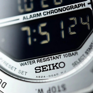 SUL EXTRAS Seiko Rotocall digital watch face with reverse display and stainless steel case detail