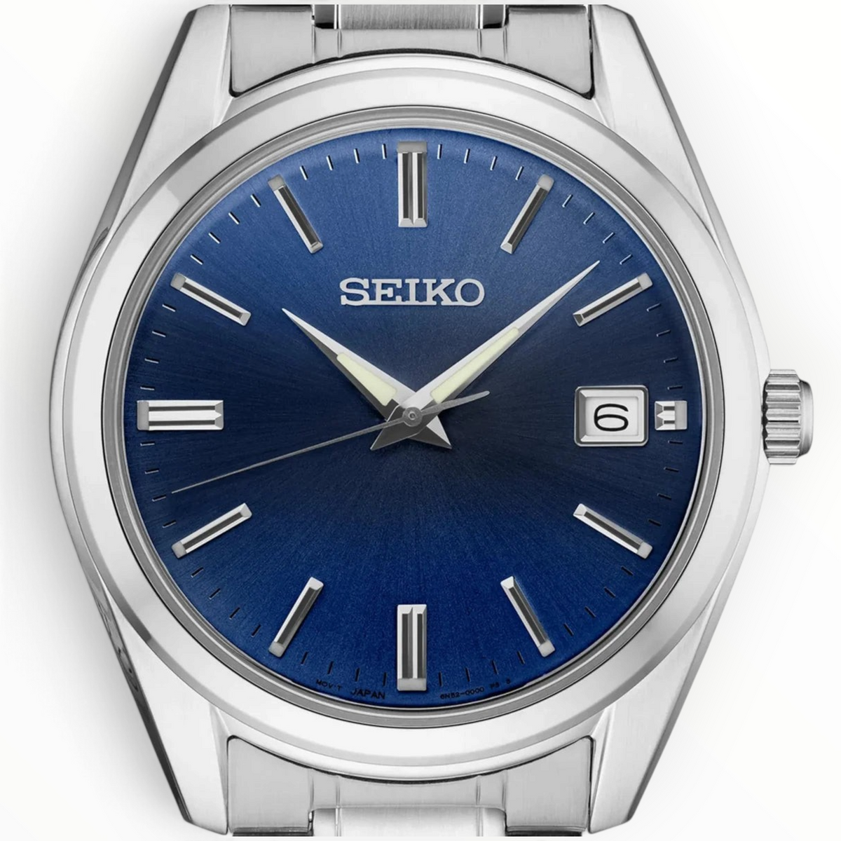 SUL EXTRAS Seiko Essentials Classic men's watch with a deep blue sunray dial, silver stainless steel case and bracelet.