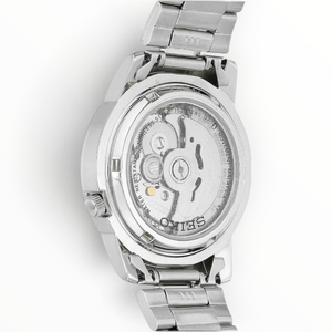 SUL EXTRAS Seiko 5 Speed Racer automatic watch showing the silver-tone stainless steel see-through exhibition case back
