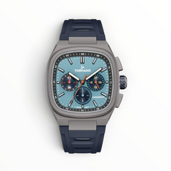 SUL EXTRAS Tornado Aristocrate men's chronograph watch with gunmetal cushion case, ice blue dial, and navy rubber strap.