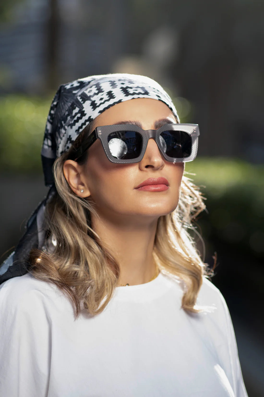 Stylish Sefsan Crimpy dolphin grey frame sunglasses with smoke lenses, lightweight construction, and trendy unisex fashion-forward style model front view 