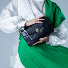 Load image into Gallery viewer, Compact Fyor BD 143 crossbody bag in durable faux leather with organized compartment and space for essentials along with detachable strap front view 

