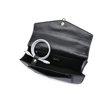 Load image into Gallery viewer, Compact Fyor BD 143 crossbody bag in durable faux leather with organized compartment, magnetic lock and space for essentials inside view 
