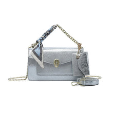 Load image into Gallery viewer, Compact Fyor BD 143 crossbody bag in durable faux leather with organized compartments, zippered sections, and space for essentials front view
