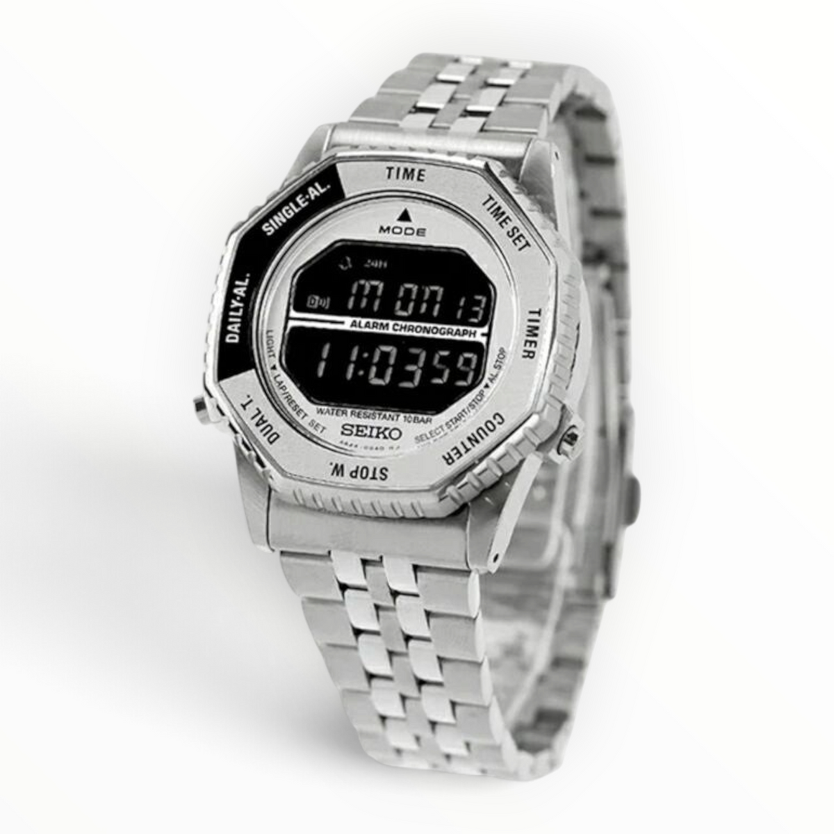 SUL EXTRAS Seiko Rotocall digital watch with silver stainless steel case, multi-link bracelet, and rotating bezel.