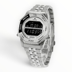 SUL EXTRAS Seiko Rotocall digital watch with silver stainless steel case, multi-link bracelet, and rotating bezel.