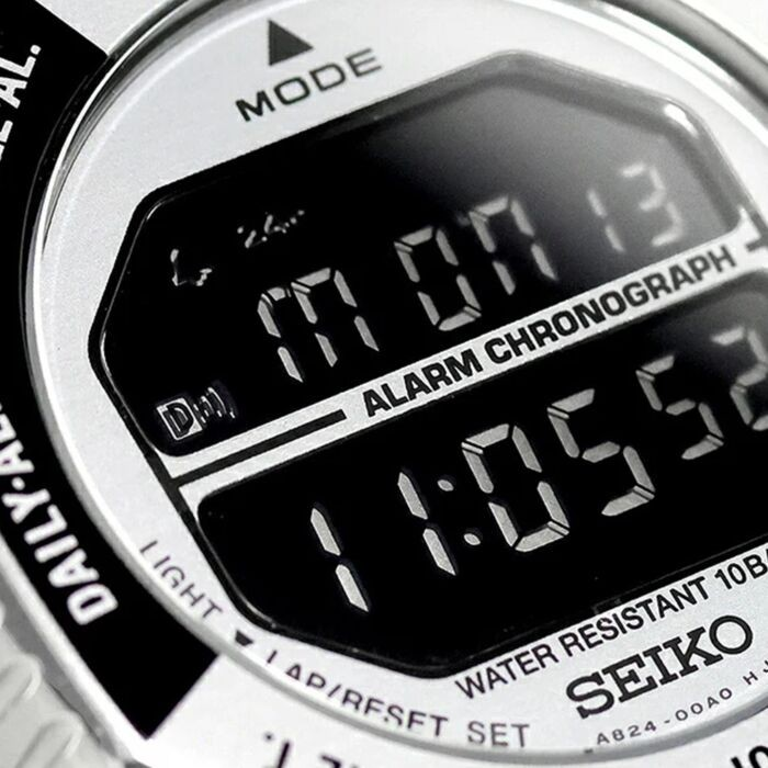 SUL EXTRAS Seiko Rotocall digital watch featuring a reverse display, rotating bezel, and stainless steel case.