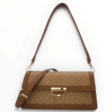 SUL EXTRAS Tom & Eva Riviera shoulder bag in tan straw-effect material with gold-tone clasp and detachable straps.