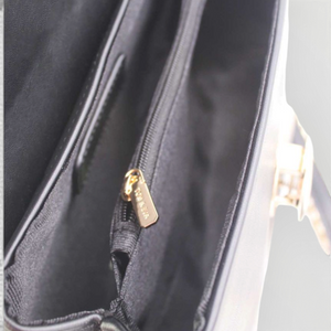 SUL EXTRAS Tom & Eva black synthetic handbag interior with two compartments, polyester lining, and gold zipper detail